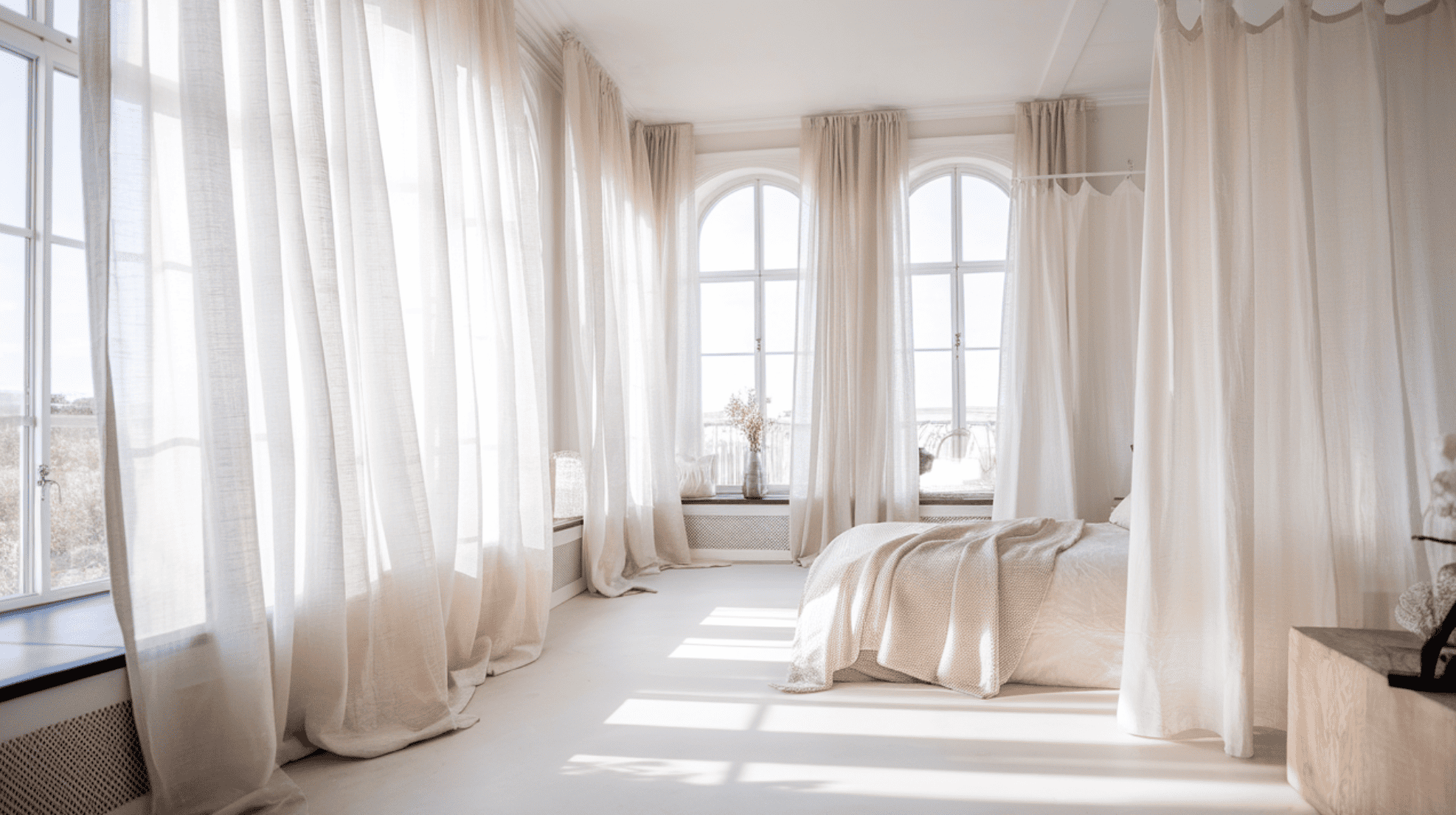 Bare Windows With White Linen Curtains