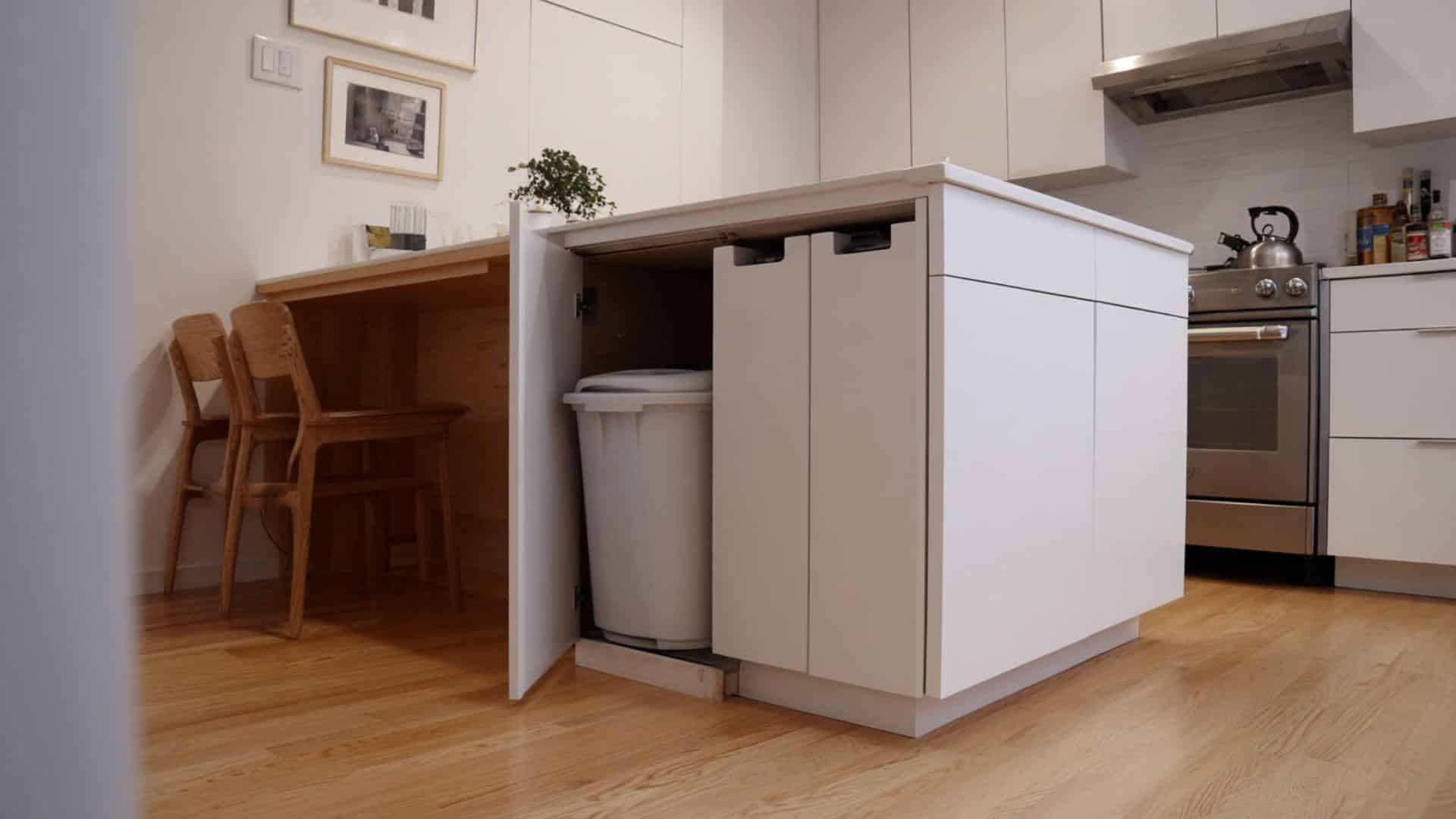 Minimalist Design with Hidden Trash and Recycling Compartments