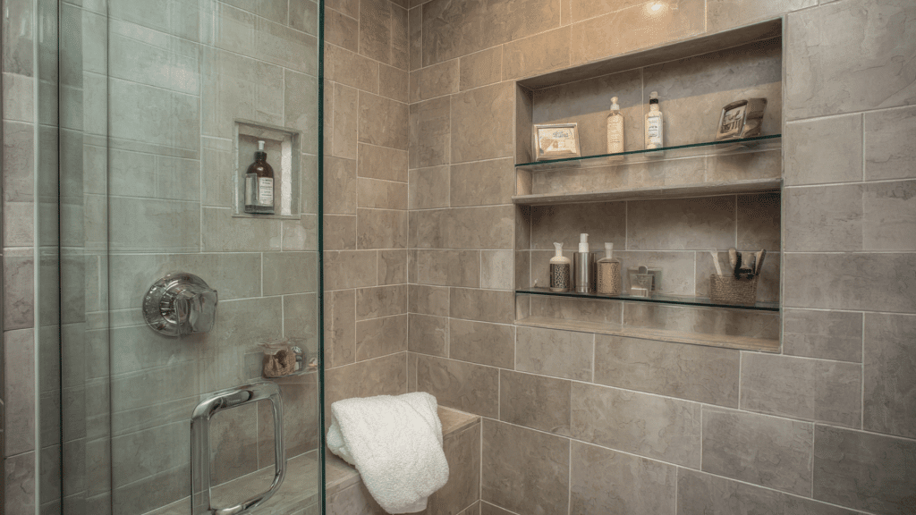 shower niche with glass shelves