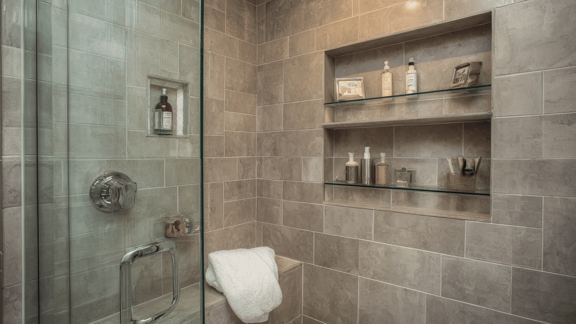 shower niche with glass shelves