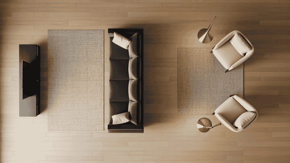 a top-down view of a minimalist living room with a black sofa, two armchairs, tv stand, and lamps on wooden floors