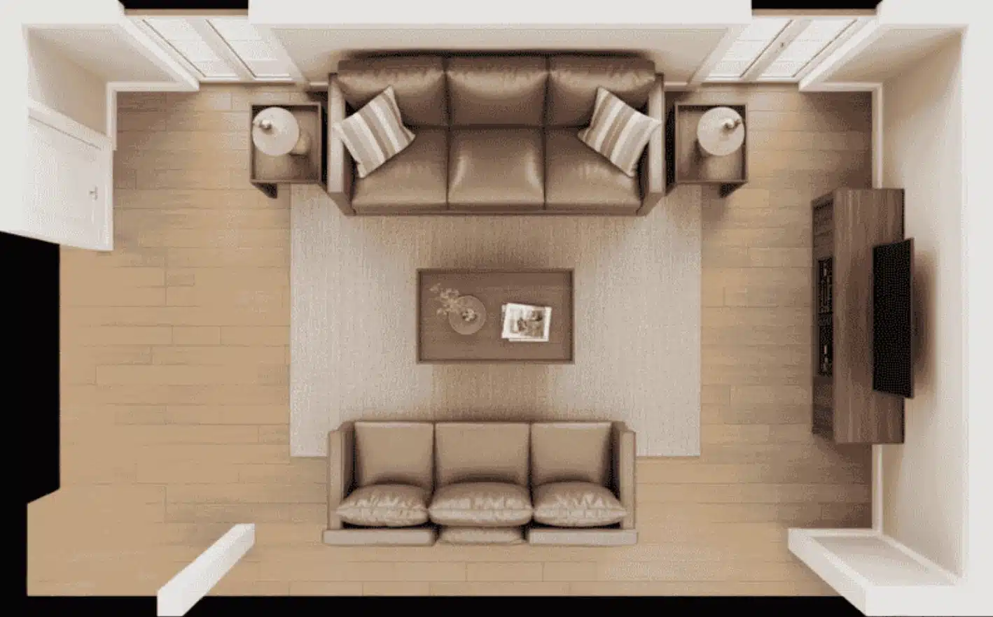 an overhead view of a cozy living room with two leather sofas, a wooden coffee table, and a tv unit