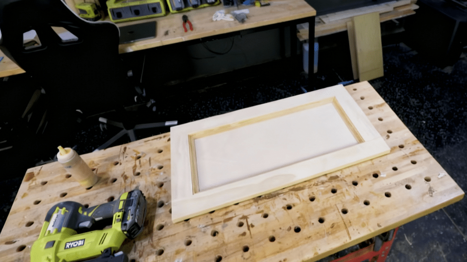 step add the plywood backer and decorative trim