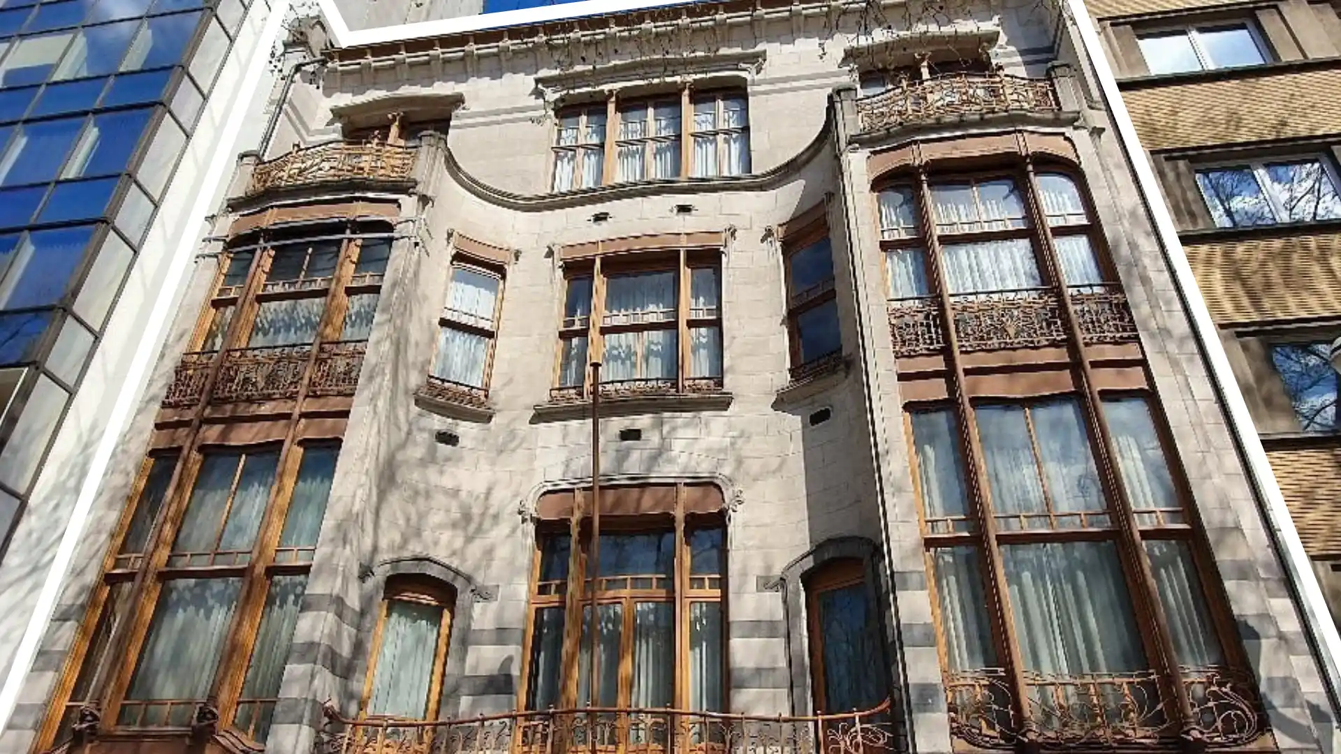hotel solvay brussels belgium displays horta's curved stone exterior with its wide windows and metal detailing