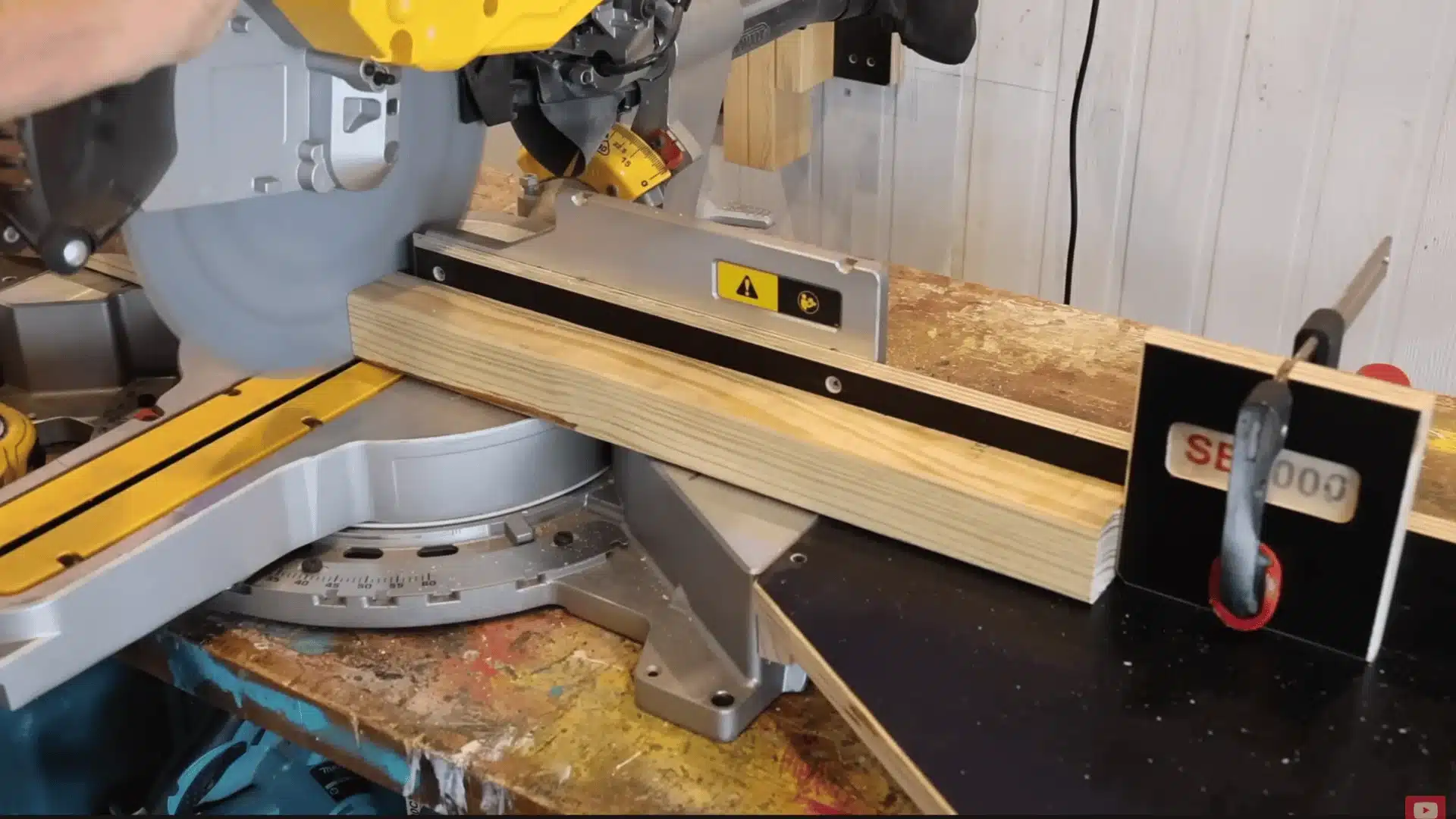 measure, riping evenly, then cuting all decking boards to final length per plan as per the require