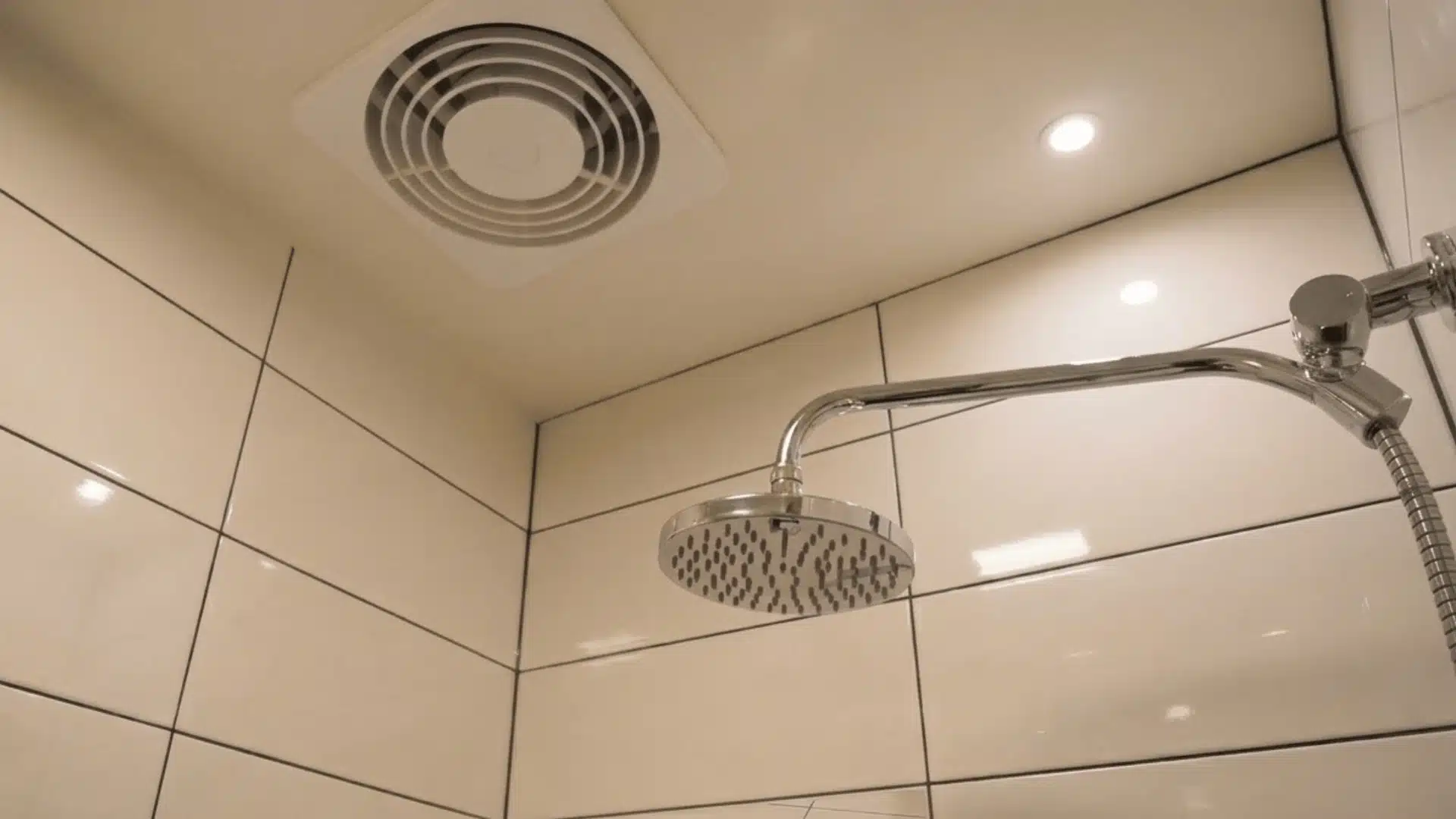 modern bathroom shower interior with white ceramic tiles make sure all the tiles are arranged properly and black