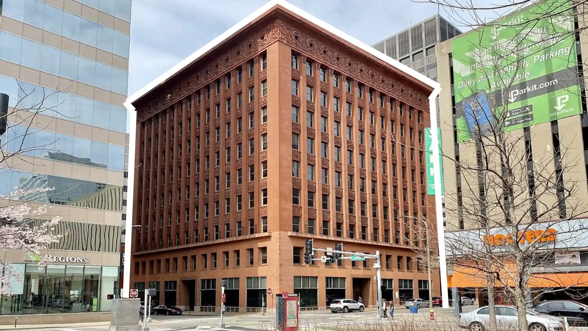 wainwright building st. louis usa shows the red brick exterior with vertical lines and floral terracotta panels