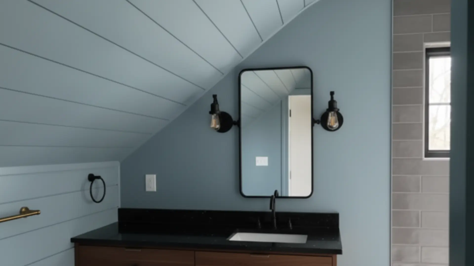 debonair color bathroom with shiplap walls, sloped ceiling, black vanity mirror, and warm wood cabinet