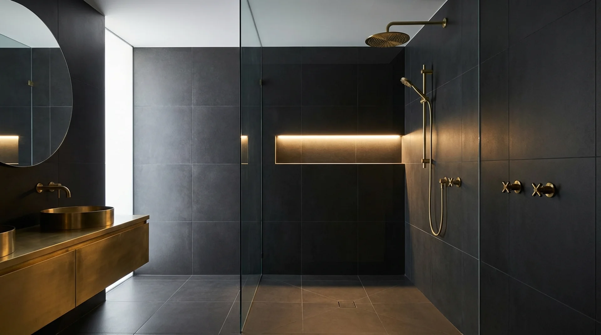modern bathroom featuring a walk-in shower with matte black wall tiles and floor tiles, creating a bold, dramatic look