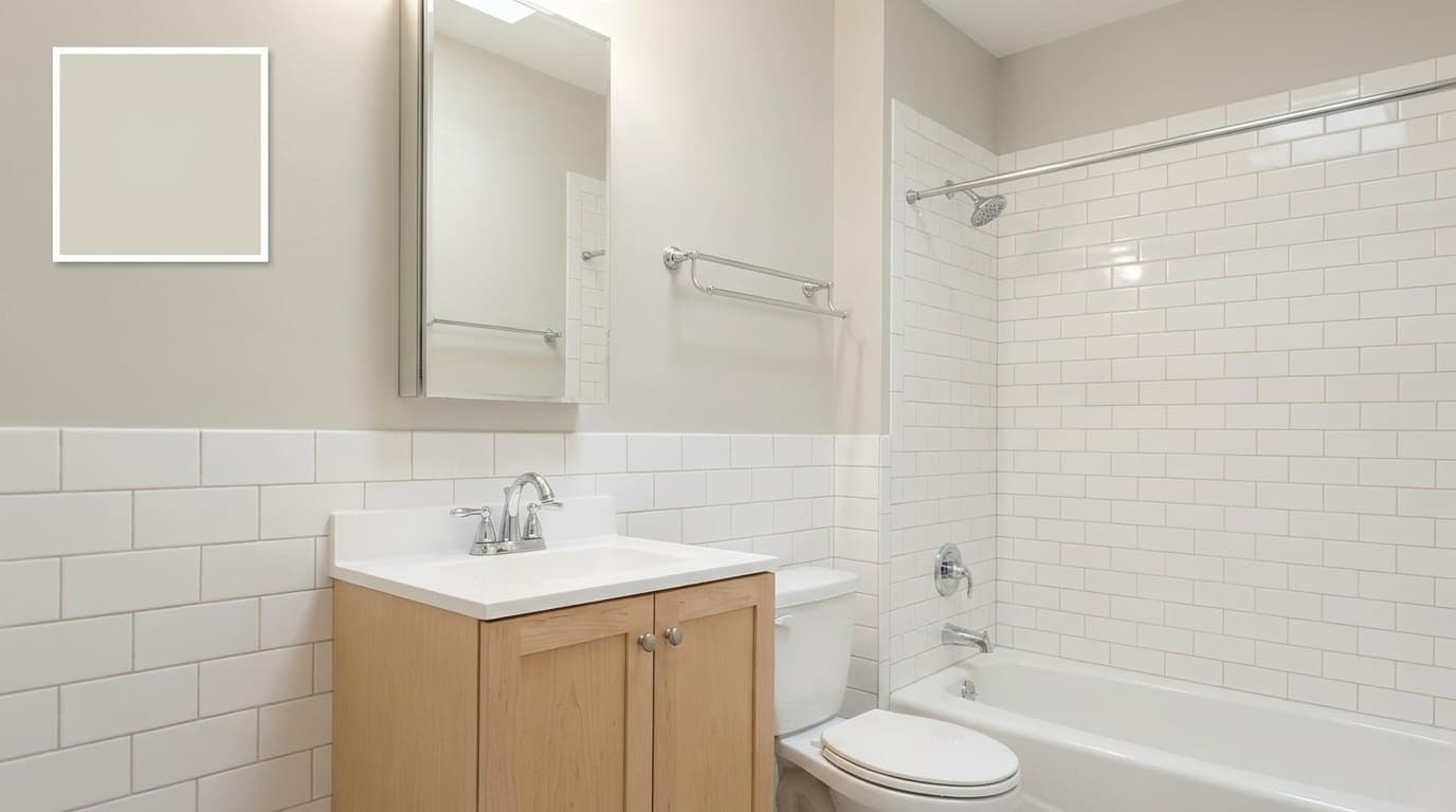 small bathroom with benjamin moore balboa mist walls creating a soft neutral space