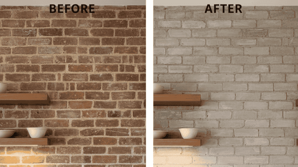 A brownish-red brick wall is transformed with limewash into a soft, neutral gray, brightening the kitchen and adding a calm, inviting touch