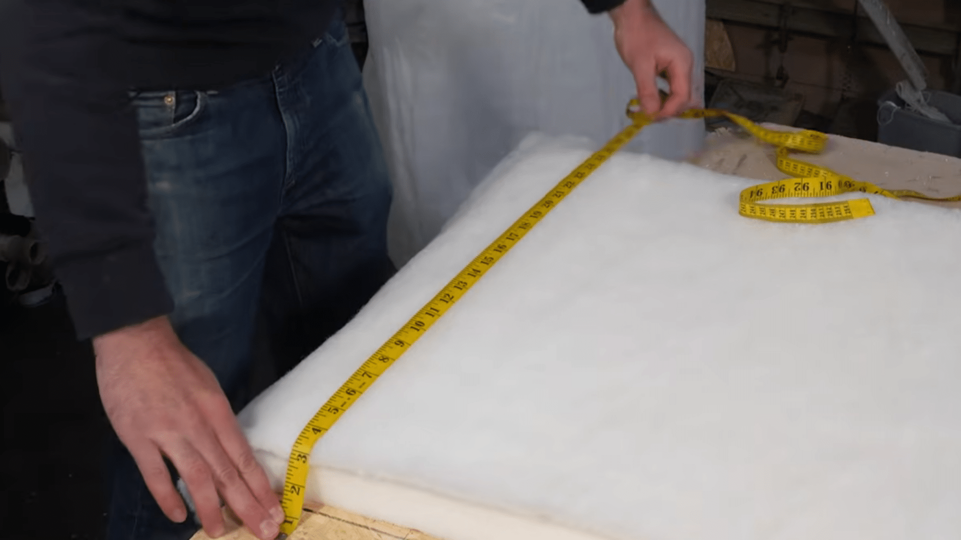 adding polyester wadding over foam layer for soft upholstered headboard surface and smooth finish