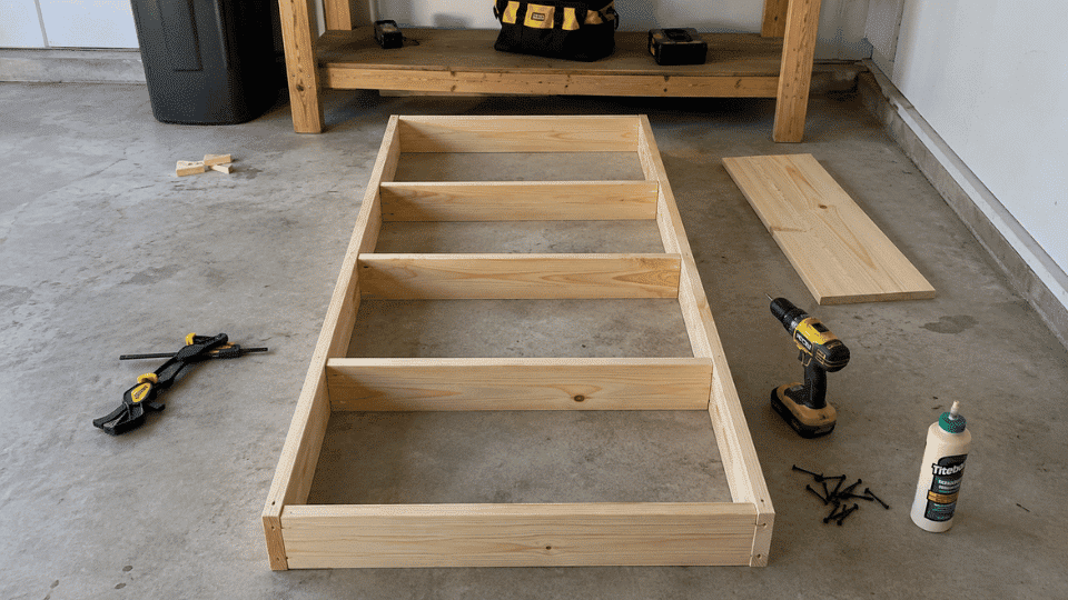 attaching middle shelves inside a wooden bookshelf frame