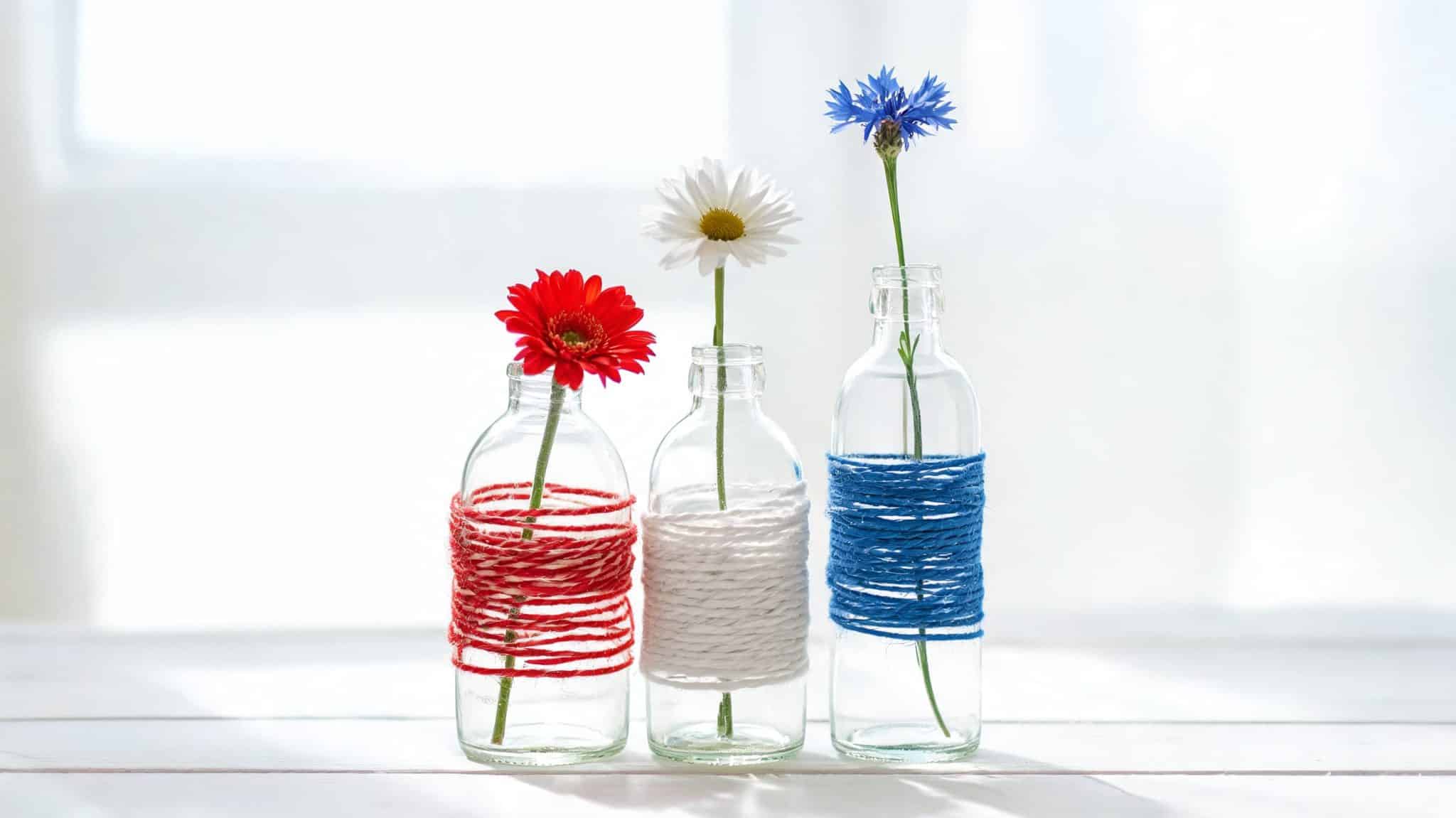 decorated bottles with patriotic twine