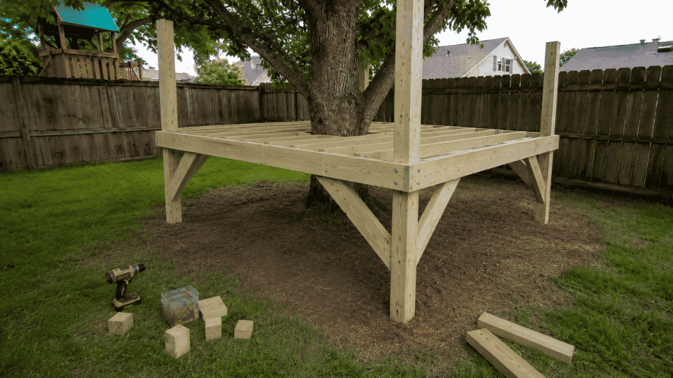 diagonal bracing added under a raised kids treehouse platform