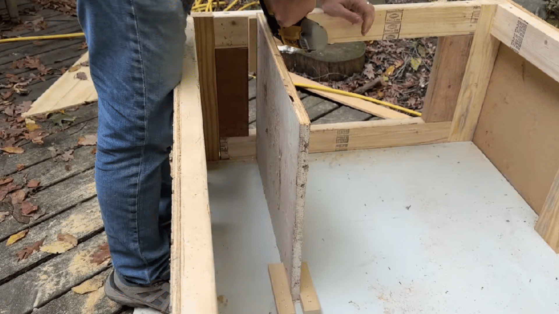 inside view of a cat shelter with small baffle walls that help block cold wind from the sleeping area