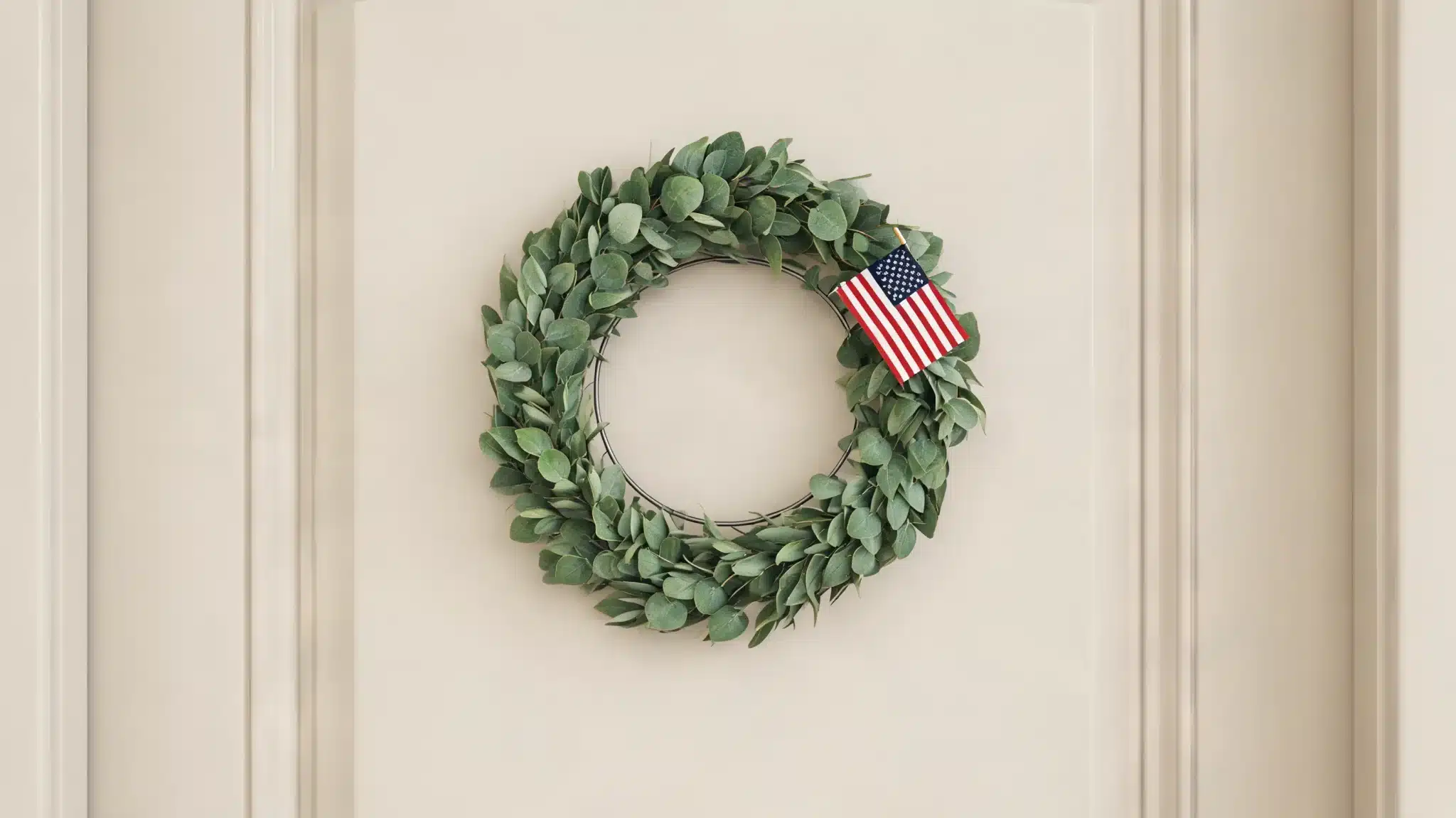 minimal greenery wreath with eucalyptus and a single american flag accent