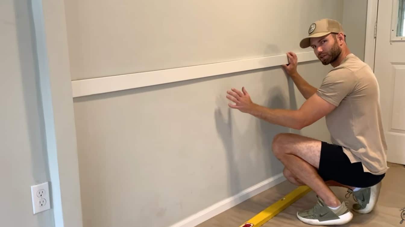 top board being placed across the wall