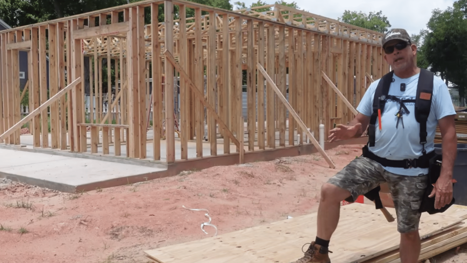 built up porch beam being assembled with lumber spacers and structural screws on a work surface
