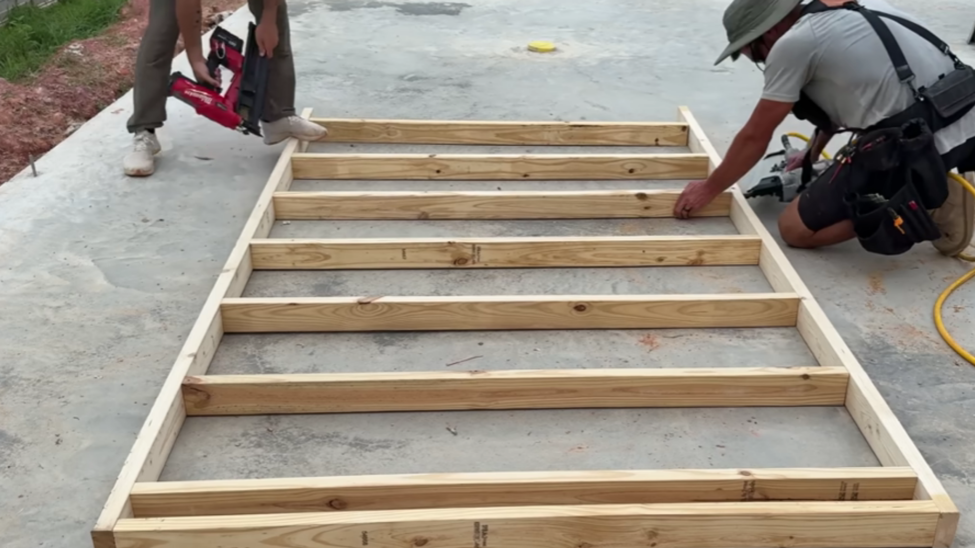 ceiling nailers being installed between porch framing members before ceiling construction