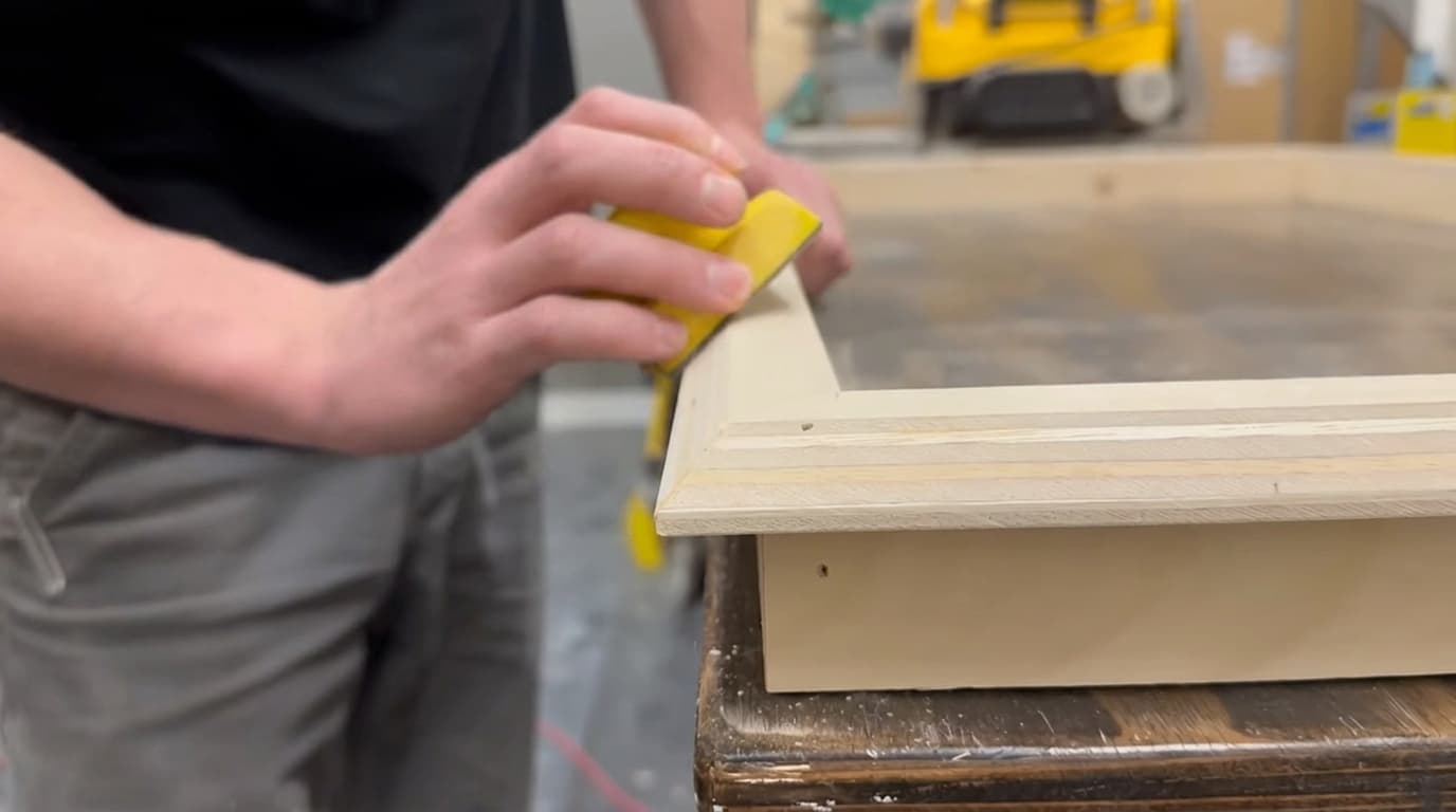 close view of smooth sanded plywood edges ready for fabric wrapping on an acoustic panel frame