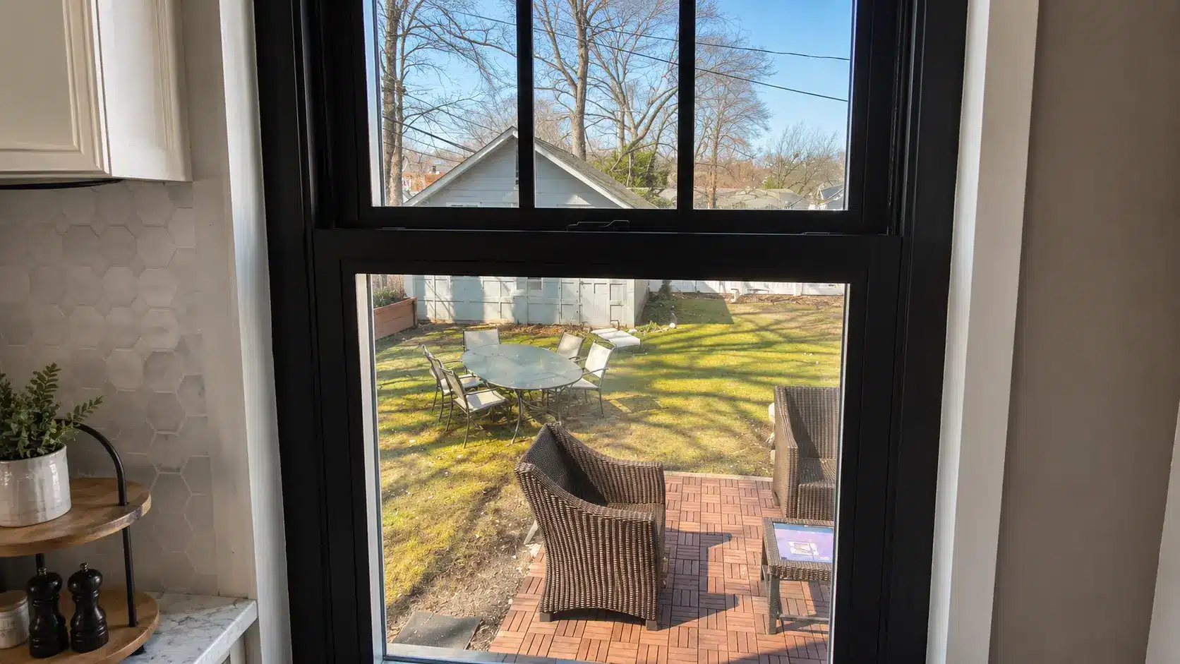 finished black vinyl window frame checked for smooth even coverage