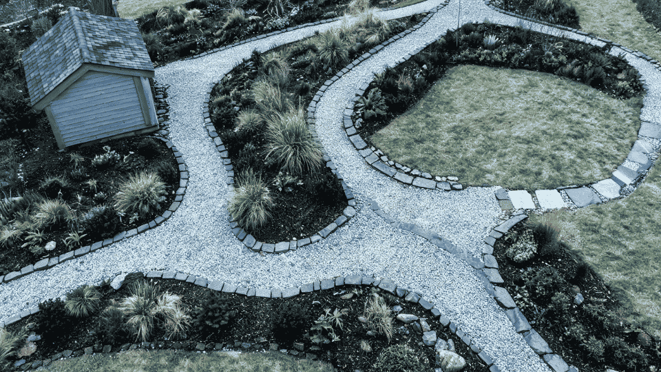 freeze-thaw paths with gravel, strong edging, cold garden beds and overhead yard layout view