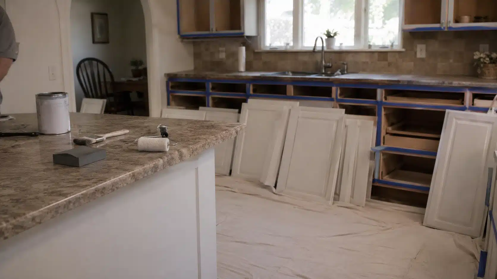how-much-does-it-cost-to-paint-kitchen-cabinets-prep-workspace