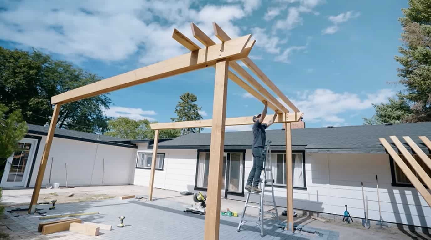 pergola cross rafters and top slats installed evenly for shade and roof detail