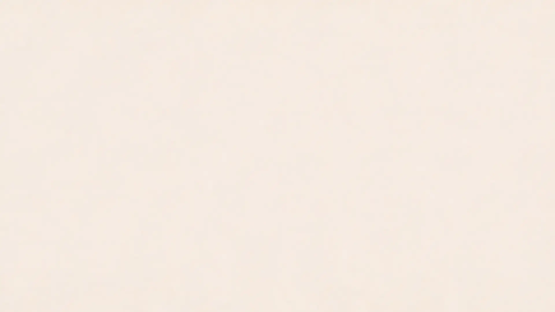 plain wall painted in Alabaster SW 7008, showing a soft warm off-white color clearly