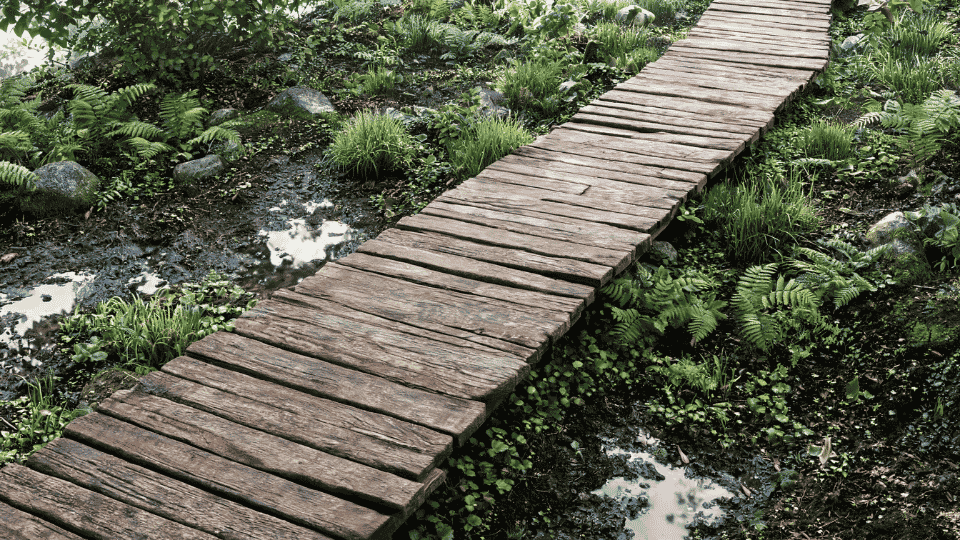 raised timber path through muddy garden area with shaded planting edges and soft elevated yard view