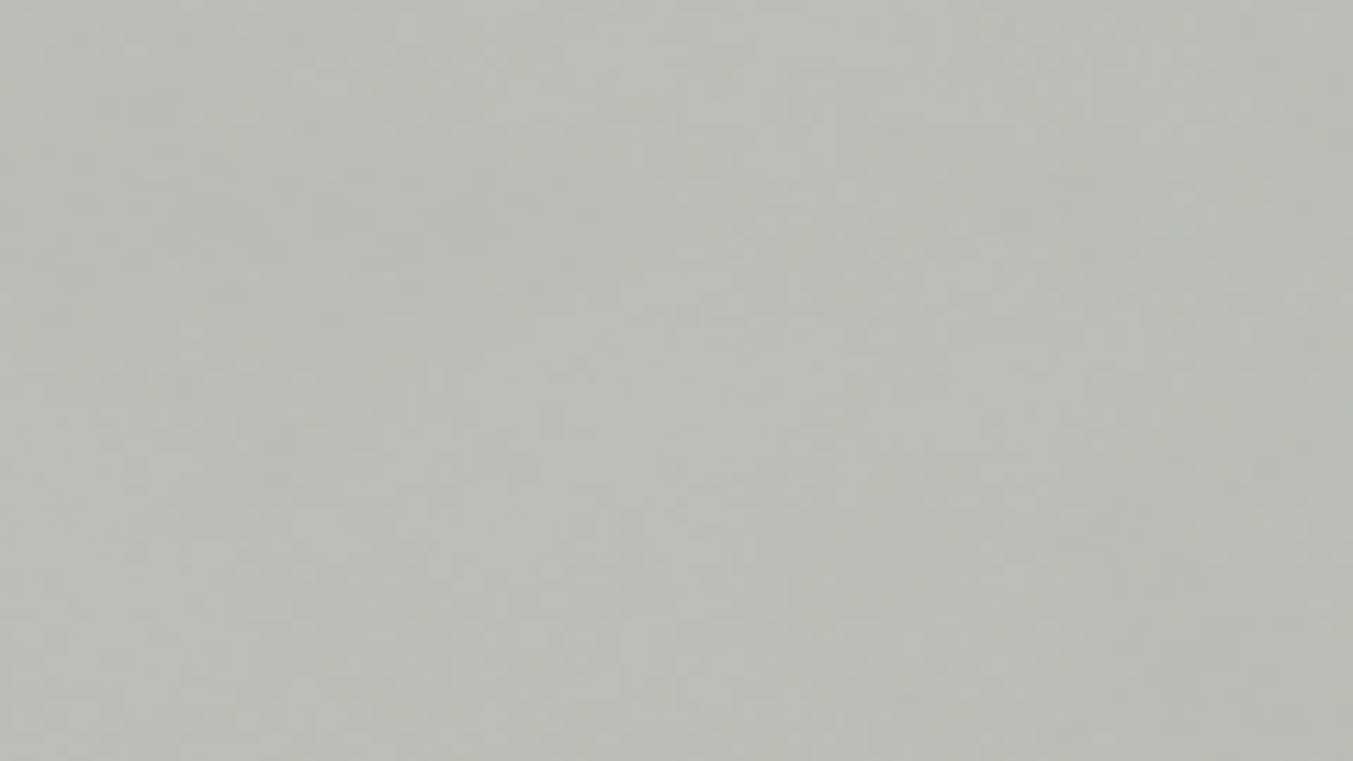 solid, uniform rectangular swatch of Stonington Gray paint. It features a muted, neutral gray tone with subtle, cool undertones