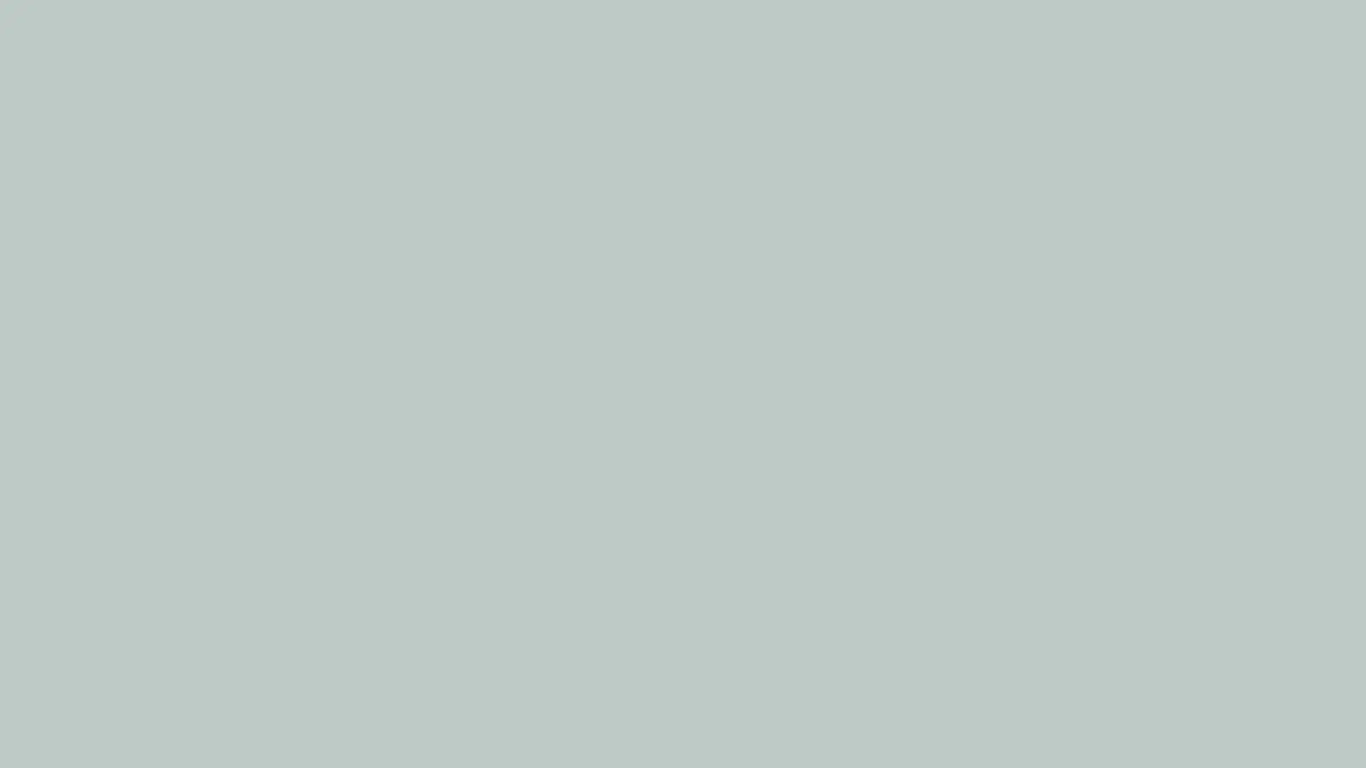 solid, uniform square swatch of a soft, muted pastel blue-gray paint color