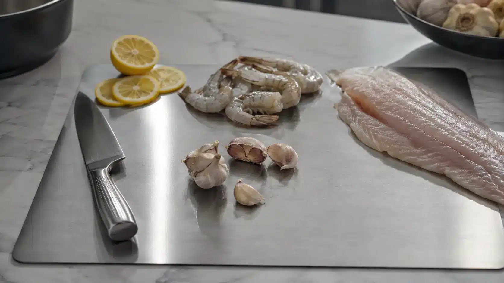 a titanium cutting board with seafood garlic and lemon showing a plastic free quick prep board for strong smelling foods