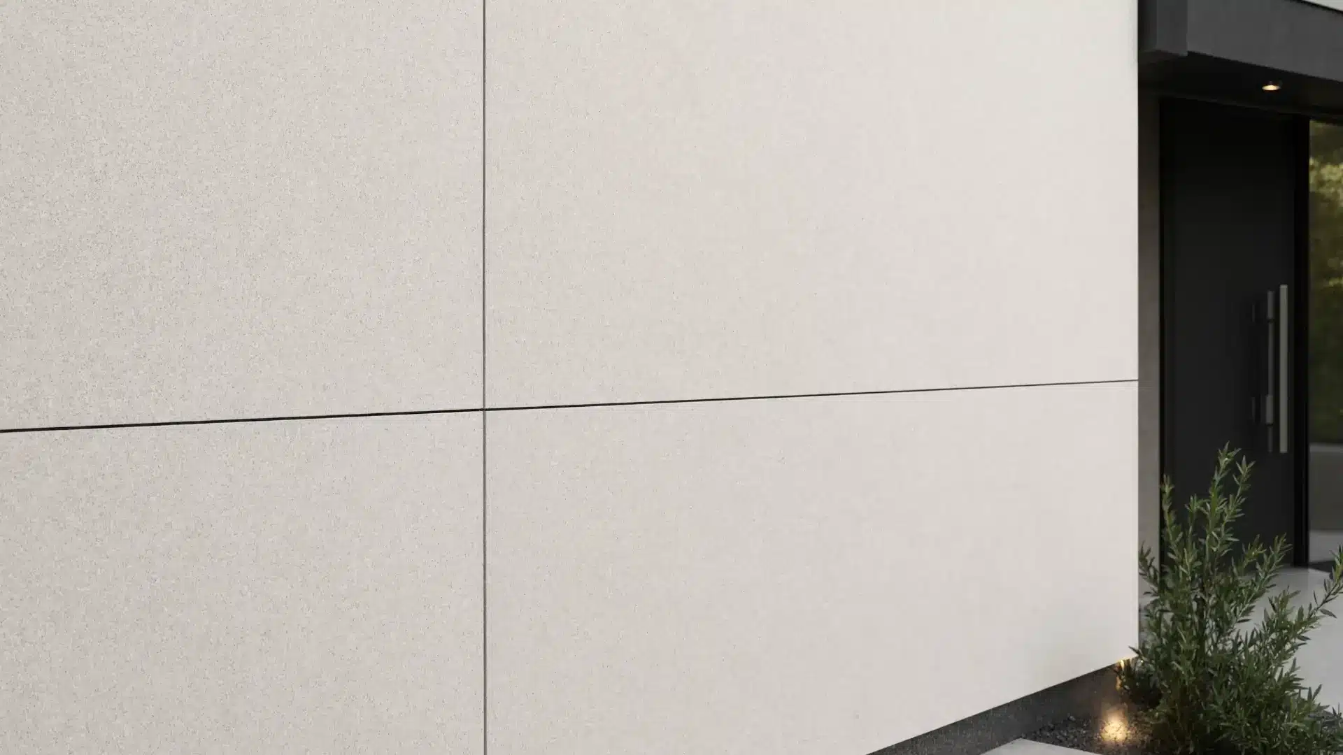 close up premium exterior wall made of engineered stone panels large seamless slabs precise alignment modern commercial style home facade smooth clean surface