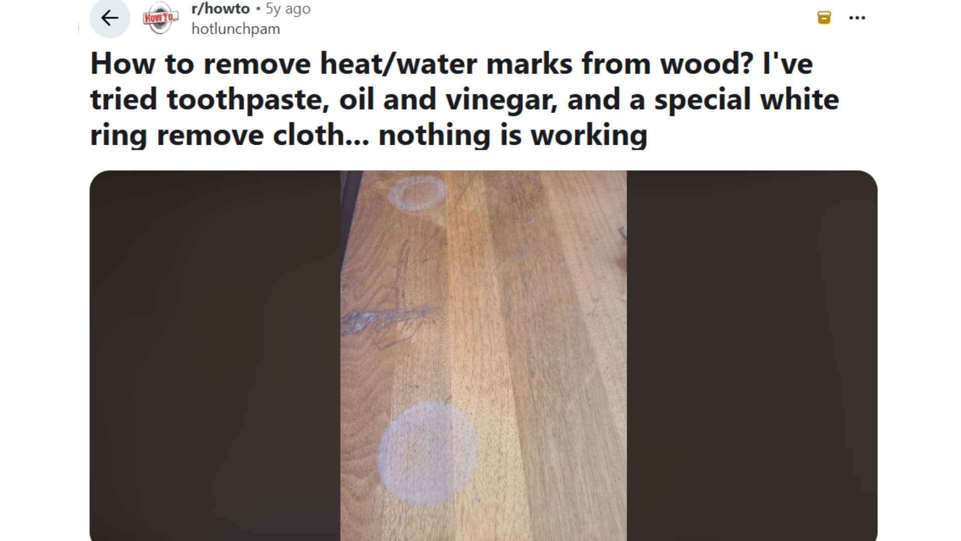 real reddit example showing stubborn white water rings on a wood table after common diy fixes