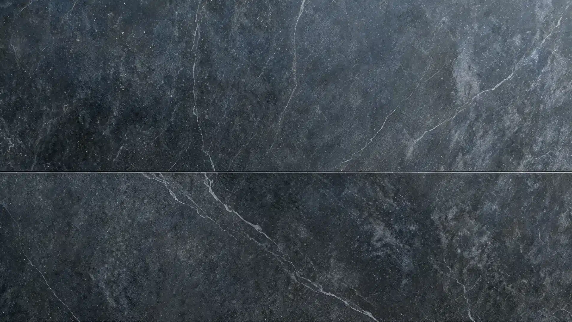soapstone exterior house wall with smooth grey soft textured modern minimalist finish