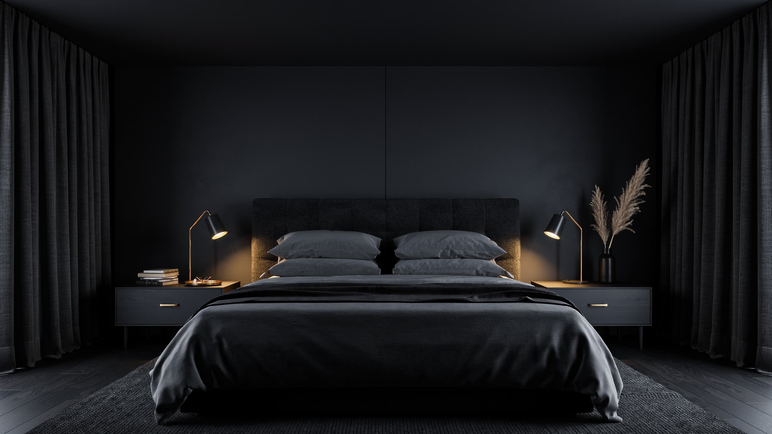 Black bedroom with upholstered black bed and layered dark textures